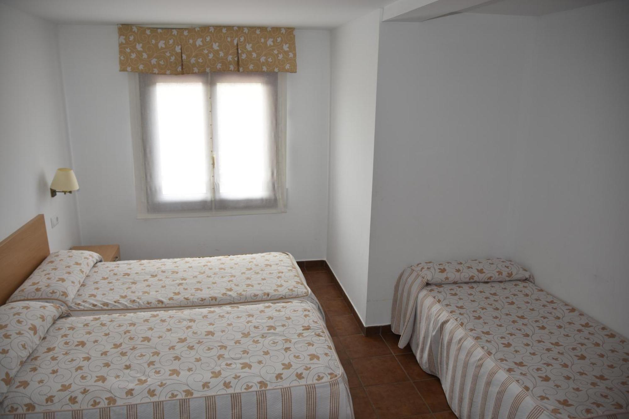 Aparthotel Tres Caminos El Grado Bagian luar foto