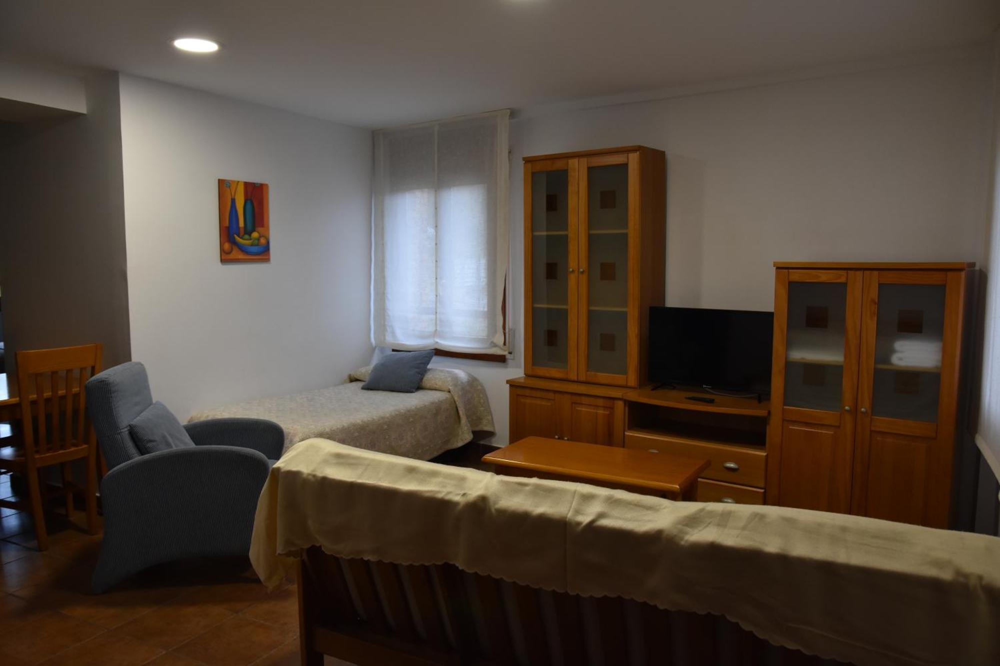 Aparthotel Tres Caminos El Grado Bagian luar foto